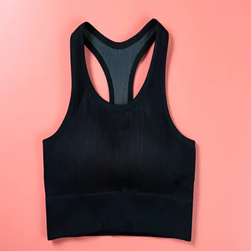 black color custom sports bra with light orange background